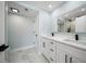 Modern bathroom boasts a double vanity, sleek fixtures, and light, bright color palette at 1400 Gulf Blvd # 801, Clearwater Beach, FL 33767