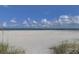 Expansive beach view with blue water and white sand at 1400 Gulf Blvd # 801, Clearwater Beach, FL 33767