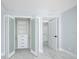 Bedroom showcases an open closet with built-in shelving and drawer storage at 1400 Gulf Blvd # 801, Clearwater Beach, FL 33767