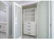 Organized closet with built-in shelves and drawers for ample storage at 1400 Gulf Blvd # 801, Clearwater Beach, FL 33767