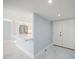 Modern kitchen with white cabinets and a breakfast bar at 1400 Gulf Blvd # 801, Clearwater Beach, FL 33767