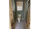 Small bathroom with shower and grab bars at 14303 14Th St, Dade City, FL 33523