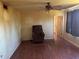 Living Room with hardwood floors and a recliner at 14303 14Th St, Dade City, FL 33523
