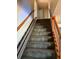 Staircase with a chair lift for accessibility at 14303 14Th St, Dade City, FL 33523