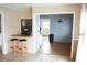Open dining room with tile floor, bar seating, and view of kitchen at 1727 Coco Palm Cir, Sun City Center, FL 33573