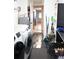 Laundry room with access to kitchen and extra storage at 1727 Coco Palm Cir, Sun City Center, FL 33573