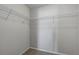 Large walk-in closet with wire shelving at 18843 Ulmus St, Lutz, FL 33558