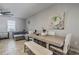 Modern dining area with light wood table and seating at 18843 Ulmus St, Lutz, FL 33558