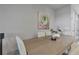 Dining area with light wood table and neutral decor at 18843 Ulmus St, Lutz, FL 33558