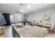Kitchen with granite island, stainless steel appliances, and dark cabinets at 18843 Ulmus St, Lutz, FL 33558