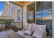 Relaxing screened patio with comfy seating at 18843 Ulmus St, Lutz, FL 33558