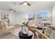 Spacious living room with neutral tones and light wood furniture at 1993 59Th N Way, St Petersburg, FL 33710