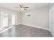 Spacious bedroom with wood-look floors and double French doors at 2746 Hibiscus St, Sarasota, FL 34239