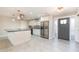 Modern kitchen boasts stainless steel appliances and an island at 2746 Hibiscus St, Sarasota, FL 34239