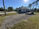 Large gravel area and detached garage at 3087 Seth Rd, North Port, FL 34288