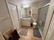 Clean bathroom featuring a walk-in shower, granite vanity, and updated fixtures at 3087 Seth Rd, North Port, FL 34288