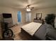 Large bedroom with ensuite bathroom access and ample closet space at 3087 Seth Rd, North Port, FL 34288