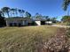 Well-maintained lawn with a spacious driveway at 3087 Seth Rd, North Port, FL 34288