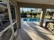 Relaxing pool area with screened enclosure and patio at 3087 Seth Rd, North Port, FL 34288