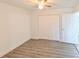 Well-lit bedroom with grey flooring and double door closet at 3534 6Th S Ave, St Petersburg, FL 33711