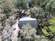 Aerial view of house nestled in woods at 39716 Tworut Rd, Webster, FL 33597