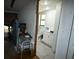 Clean bathroom with a toilet, vanity, and tiled floor at 39716 Tworut Rd, Webster, FL 33597