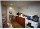 Small kitchen with wood cabinets and a stovetop at 39716 Tworut Rd, Webster, FL 33597