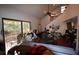 Spacious living room with high ceilings and access to a deck at 39716 Tworut Rd, Webster, FL 33597