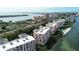 Aerial view of waterfront condos with resort amenities at 4951 Bacopa S Ln # 302, St Petersburg, FL 33715