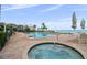 Inviting community pool with a jacuzzi at 4951 Bacopa S Ln # 302, St Petersburg, FL 33715