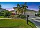 Beautiful two-story home with landscaped yard and three-car garage at 5316 Loon Nest Ct, Apollo Beach, FL 33572