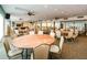 Large banquet hall with multiple tables and chairs at 7400 Sun Island S Dr # 104, South Pasadena, FL 33707