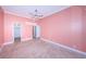 Spacious bedroom with tile floors and ceiling fan at 7400 Sun Island S Dr # 104, South Pasadena, FL 33707