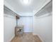 Walk-in closet with shelving and a safe at 7400 Sun Island S Dr # 104, South Pasadena, FL 33707