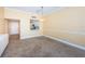 Bright dining room features tile flooring and kitchen pass-through at 7400 Sun Island S Dr # 104, South Pasadena, FL 33707