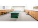 Community game room with ping pong table and seating at 7400 Sun Island S Dr # 104, South Pasadena, FL 33707