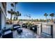 Spacious patio with seating area and water views at 7400 Sun Island S Dr # 104, South Pasadena, FL 33707