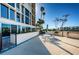Outdoor patio area with table and chairs, and BBQ grills at 7400 Sun Island S Dr # 104, South Pasadena, FL 33707