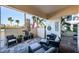 Relaxing patio with comfortable seating and lush tropical plants at 7400 Sun Island S Dr # 104, South Pasadena, FL 33707