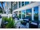 Private patio with seating area and water views at 7400 Sun Island S Dr # 104, South Pasadena, FL 33707