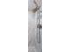 Walk-in shower with marble tile and handheld shower head at 7400 Sun Island S Dr # 104, South Pasadena, FL 33707