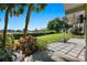 Landscaped backyard with patio, providing scenic water views at 808 Monterey Ne Blvd, St Petersburg, FL 33704