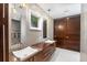 Elegant bathroom with double sinks and mosaic tile at 808 Monterey Ne Blvd, St Petersburg, FL 33704