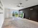 Spacious bedroom with water views and ceiling fan at 808 Monterey Ne Blvd, St Petersburg, FL 33704