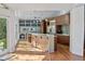 Updated kitchen with an island, hardwood floors, and modern cabinetry at 808 Monterey Ne Blvd, St Petersburg, FL 33704