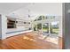 Spacious living area with hardwood floors, built-ins & backyard access at 808 Monterey Ne Blvd, St Petersburg, FL 33704