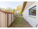 Backyard with shed and wooden fence at 8493 Cypress Lake Cir, Sarasota, FL 34243