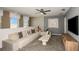 Loft area with a sectional sofa, and neutral decor at 9810 Crescent Moon Dr, Riverview, FL 33578