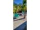 Backyard with fire pit, teal chairs, and gravel area at 4801 14Th S Ave, St Petersburg, FL 33711
