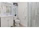 Modern bathroom with white vanity and a walk in shower at 4801 14Th S Ave, St Petersburg, FL 33711